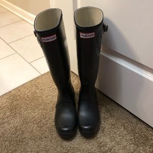 Tall black hunter rain boots